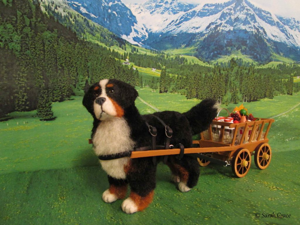 Majestic miniature Bernese Mountain Dog sculpture featuring tri-color coat by Sarah Grace